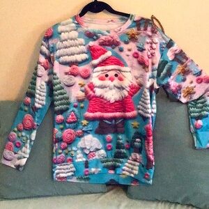 Item 9 Holiday top, front has Santa, back has screen without Santa.